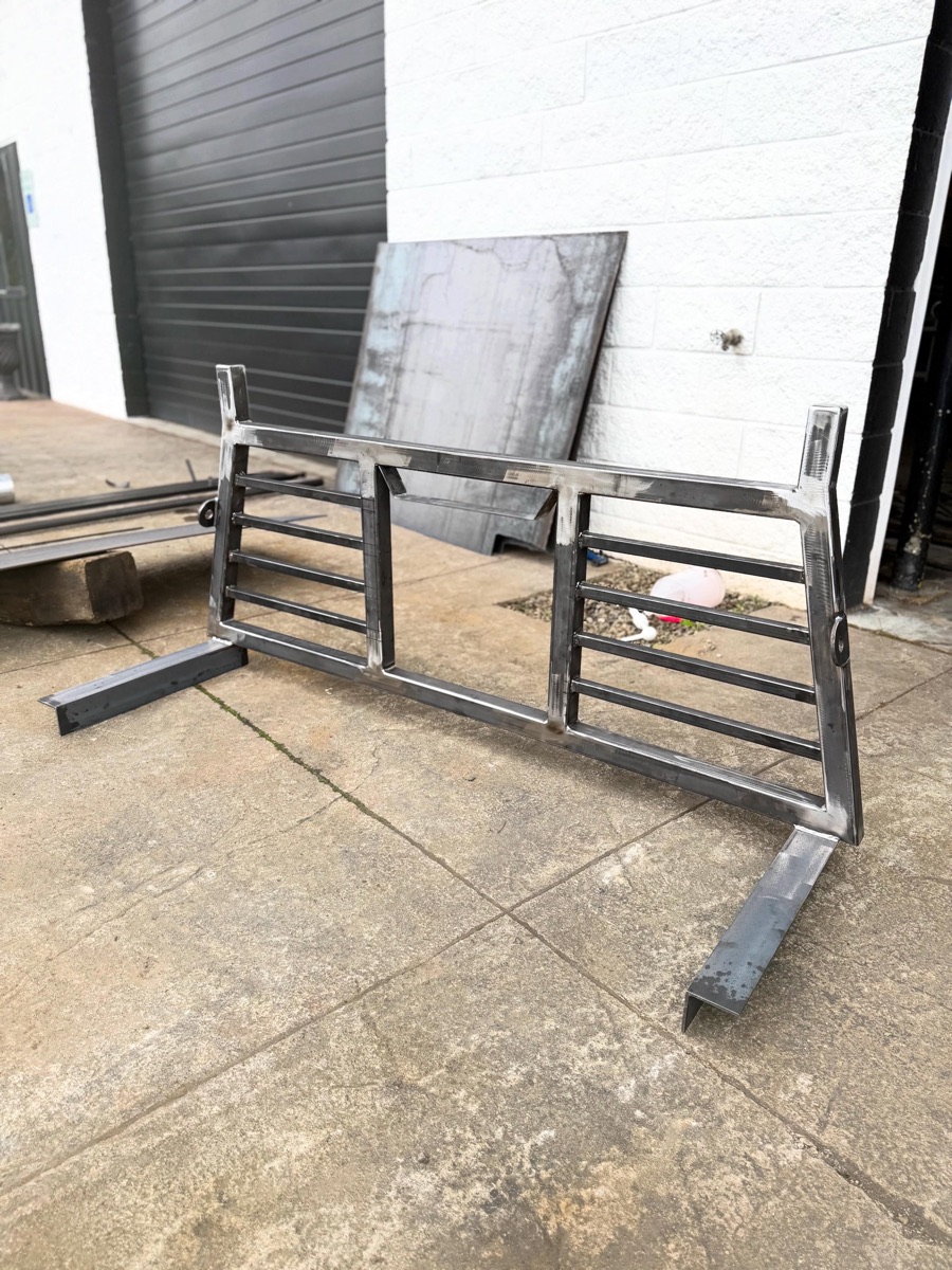 Raw welded headache work rack for a Toyota Tacoma